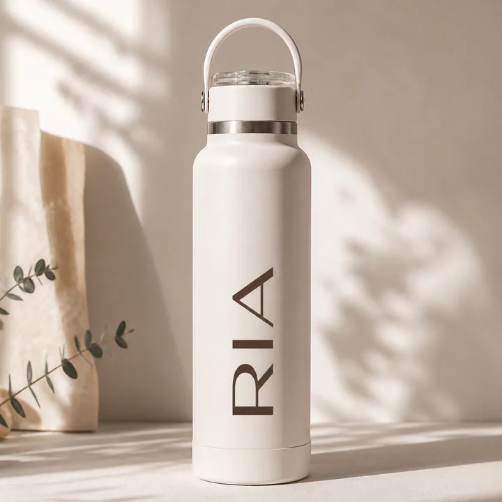 Cream insulated bottle personalized with a vertical name